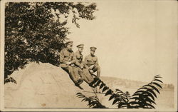 Three Soldiers Posing on Rock Postcard