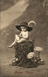 Bonne Annee A baby sits atop a tree stump wearing a hat and holding a letter. Postcard