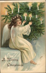 Angel Lighting Candles on the Tree Postcard