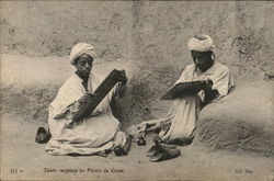 Talebs Recopiant les Versels du Coran Postcard