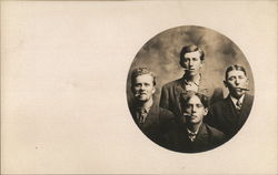 Snapshot of Four Men Smoking Cigars Postcard