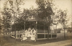 Women Posing on Porch Postcard