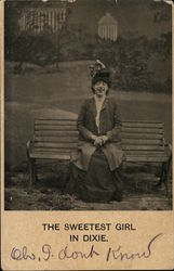 The Sweetest Girl in Dixie - woman sitting on a bench Postcard