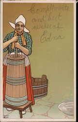 Dutch woman churning butter Postcard