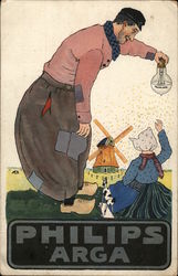 Philips Arga - man holding a sprinkling lightbulb over a Dutch girl Postcard