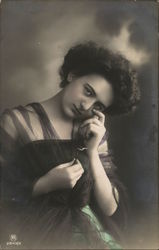 Sultry Dark-Haired Woman With Head Tilted Postcard