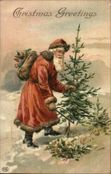 Christmas Greetings - Santa cutting a tree in the snow Postcard