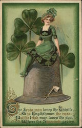 Woman dressed in green sitting on a hat with clover Postcard