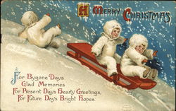 A Merry Christmas - children sledding, one falling off Postcard Postcard Postcard