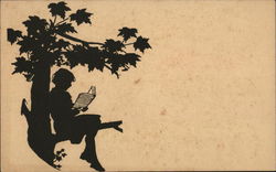 Girl reading in a tree Postcard