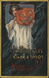 Halloween Greetings Enjoy Yourself - girl holding jack o lantern Postcard