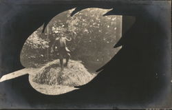 Man Posing in a Pile of Straw Leaf Vignette Postcard