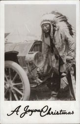 Indian Chief Posing in Front of a Car Postcard