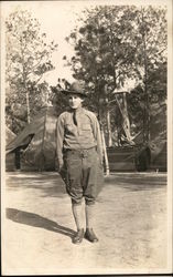 Soldier Posing in Camp Postcard