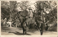 Soldier in Camp Posing on a Horse Postcard