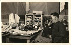 Man at a Desk Gazing at a Photograph People in Uniform Postcard Postcard Postcard