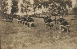 Soldiers Firing Rifles Postcard