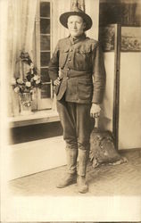 Soldier Posing in Front of a Window Postcard