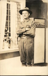 Soldier Posing in Front of a Window Postcard