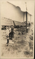 Looking on at a Derailed Train Postcard