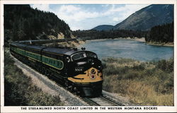 The Streamliner North Coast Limited in the Western Montana Rockies Railroad (Scenic) Postcard Postcard