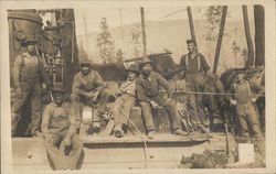 Seven Workmen with Logging Machinery and Timber in Background Postcard Postcard Postcard