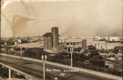 Grain Elevator in Foreground, Sign: Globe "A1" Flour Postcard