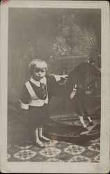 Boy Posing With Rocking Horse Postcard