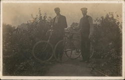 Two Men and Their Bikes Postcard