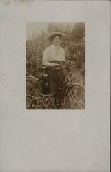 Woman With Bicycle Postcard