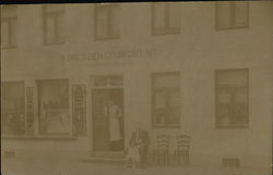 P. Dressen-Coumont Men Outside Cafe or Shop Postcard