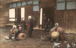 Happy people sitting outside the house. Japan Postcard Postcard