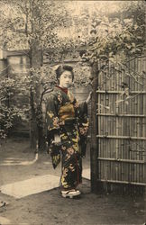 A Japanese lady in a Kimono Postcard Postcard