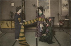 Japanese women dressing up Postcard