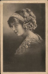 Young Woman with Headband and Large Flower in Hair Postcard