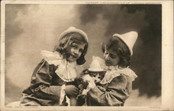 Two Little Girls and a Cat all Wearing Hats Postcard Postcard Postcard