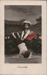 Little Girl With Hands on Fallen Little Boy Children Postcard Postcard Postcard