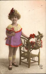 Little Girl Standing next to a Chair with Flowers Girls Postcard Postcard Postcard