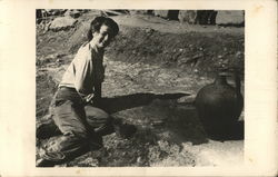 Person Leaning on Ground Near Large Pottery Piece Athens, Greece Greece, Turkey, Balkan States Postcard Postcard Postcard