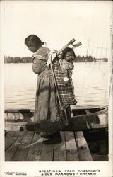 Woman Carrying Child on Back Standing Near Boat Postcard