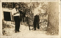 Men Holding A Large Hanging Fish Postcard Postcard Postcard