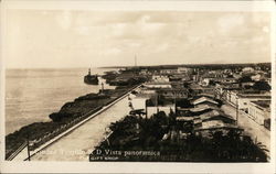 Wide View Shoreline and City Near Water Postcard