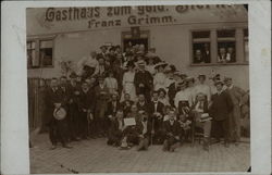 Large Group of People Posing in Front of Gasthaus - Franz Grimm Postcard