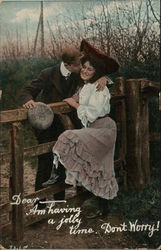 Young Man Embracing Smiling Young Woman Over Fence Couples Postcard Postcard