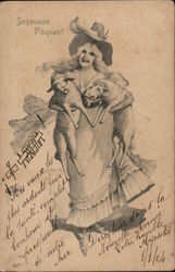 Long-Haired Woman Wearing Hat Carrying Two Lambs Postcard