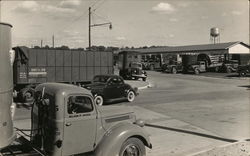 Two Crossroads with Trucks Postcard