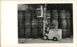 Man on Clark Forklift Lifting a Barrel Benton Harbor, MI House of David Postcard Postcard Postcard