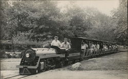 Miniature Train Filled with Passengers - House of David Park Postcard