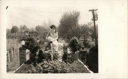 A Woman Sitting in Garden Benton Harbor, MI Postcard Postcard Postcard