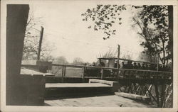 Miniature Train on Bridge with Passengers - House of David Park Postcard